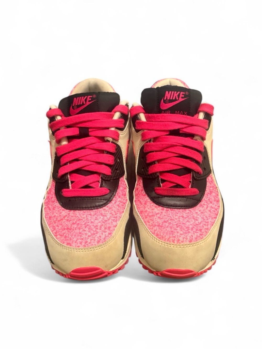 Nike Air Max 90 sneakers in pink, black, and beige